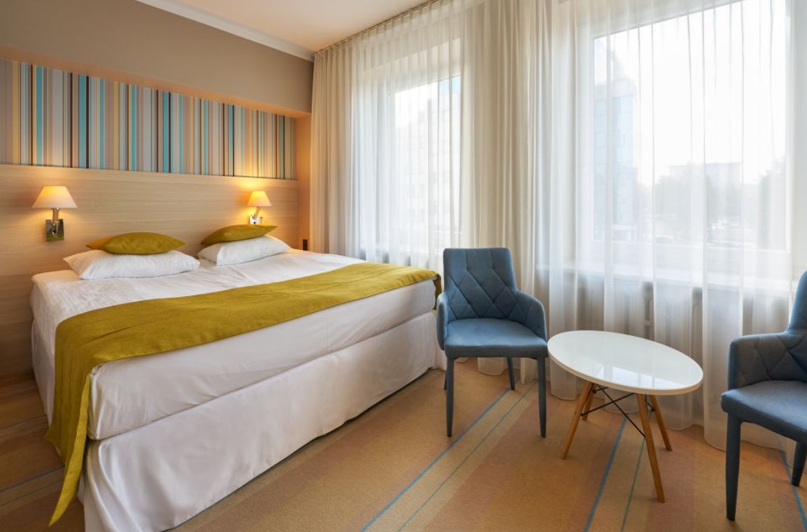 Interior view of Hotel Cristal, showing guest room or lobby area