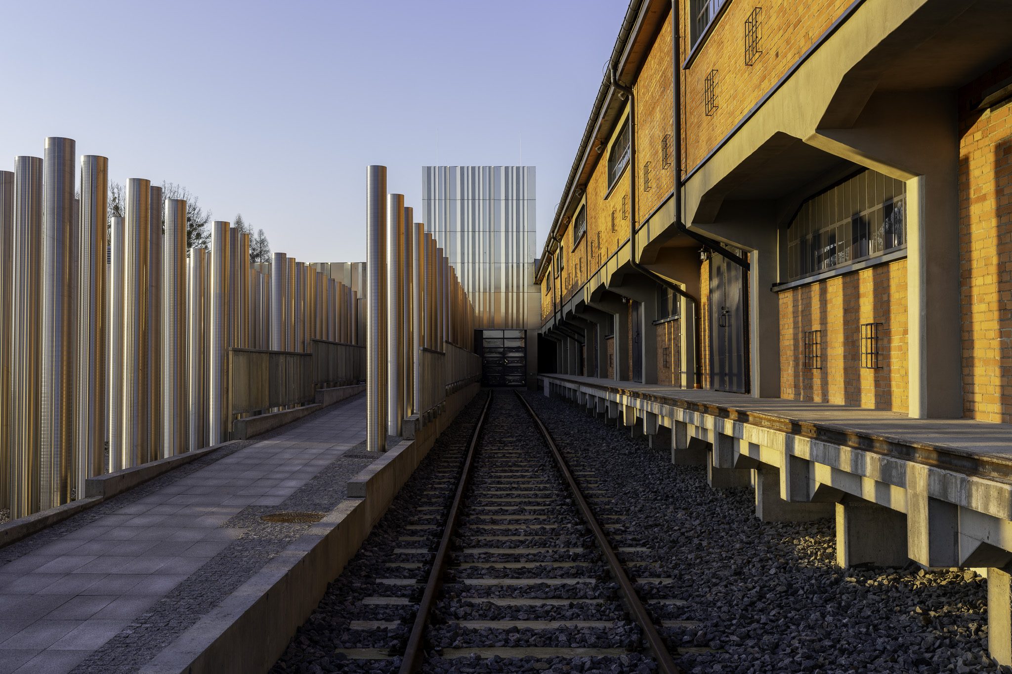 Railway tracks leading to the Sybir Memorial Museum building